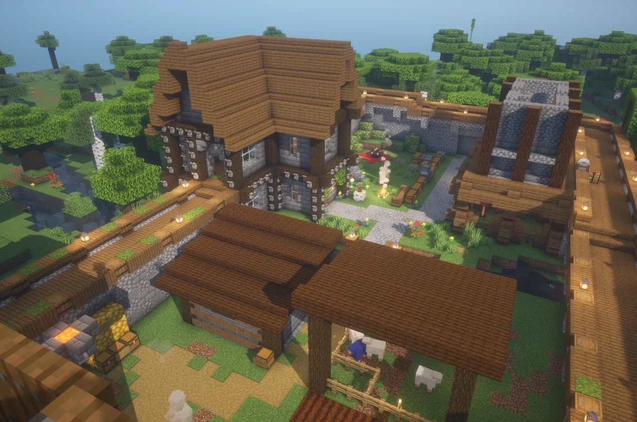 Mittelalterliche Minecraft-Siedlung aus der Vogelperspektive Vogelperspektive einer mittelalterlichen Minecraft-Siedlung mit großen Fachwerkhäusern, Stadtmauer, Holzbrücken, begrüntem Innenhof und einem überdachten Schafgehege.